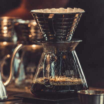 Framed moody coffee photography from the Night Brew series displayed in a contemporary interior