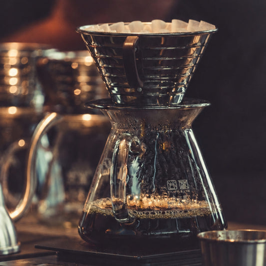 Framed moody coffee photography from the Night Brew series displayed in a contemporary interior